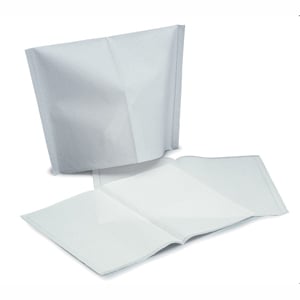 Quala 10" x 10" White Polycoated Headrest Covers. Manufactured from soft facial